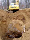 New_Home_Big_rock_with_ho_for_size_comparison.jpg (1995098 bytes)