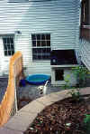 dog_house_fence__pet_door_2002.jpg (142849 bytes)